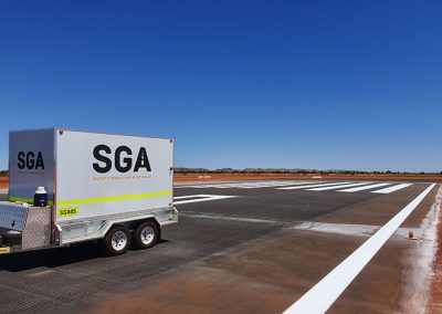 SGA team doing final touches on runway line markings