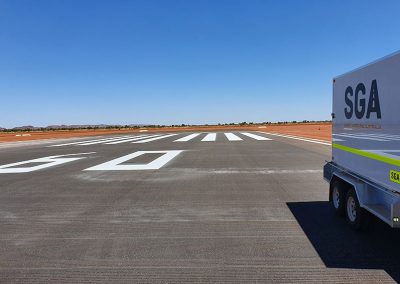 SGA team completing line markings on a runway
